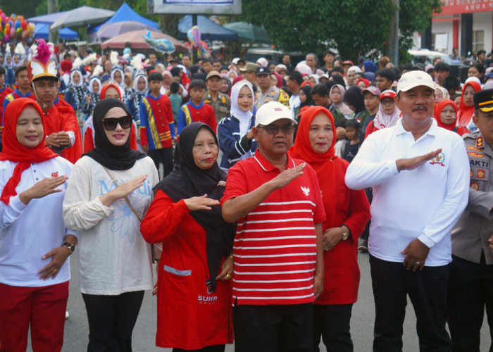Kobarkan Semangat Kemerdekaan, Pawai Pembangunan Banjiri Jalan Kota Arga Makmur